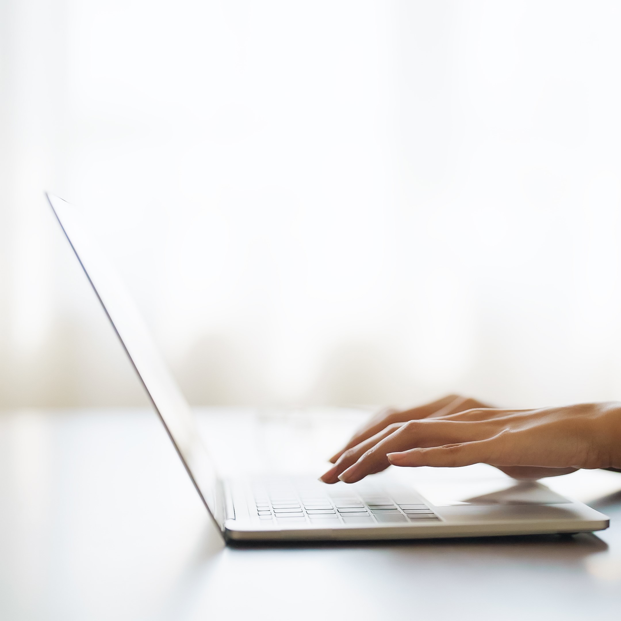 A woman reading on her laptop that Life Choice offers free pregnancy services and support in Russellville, Kentucky