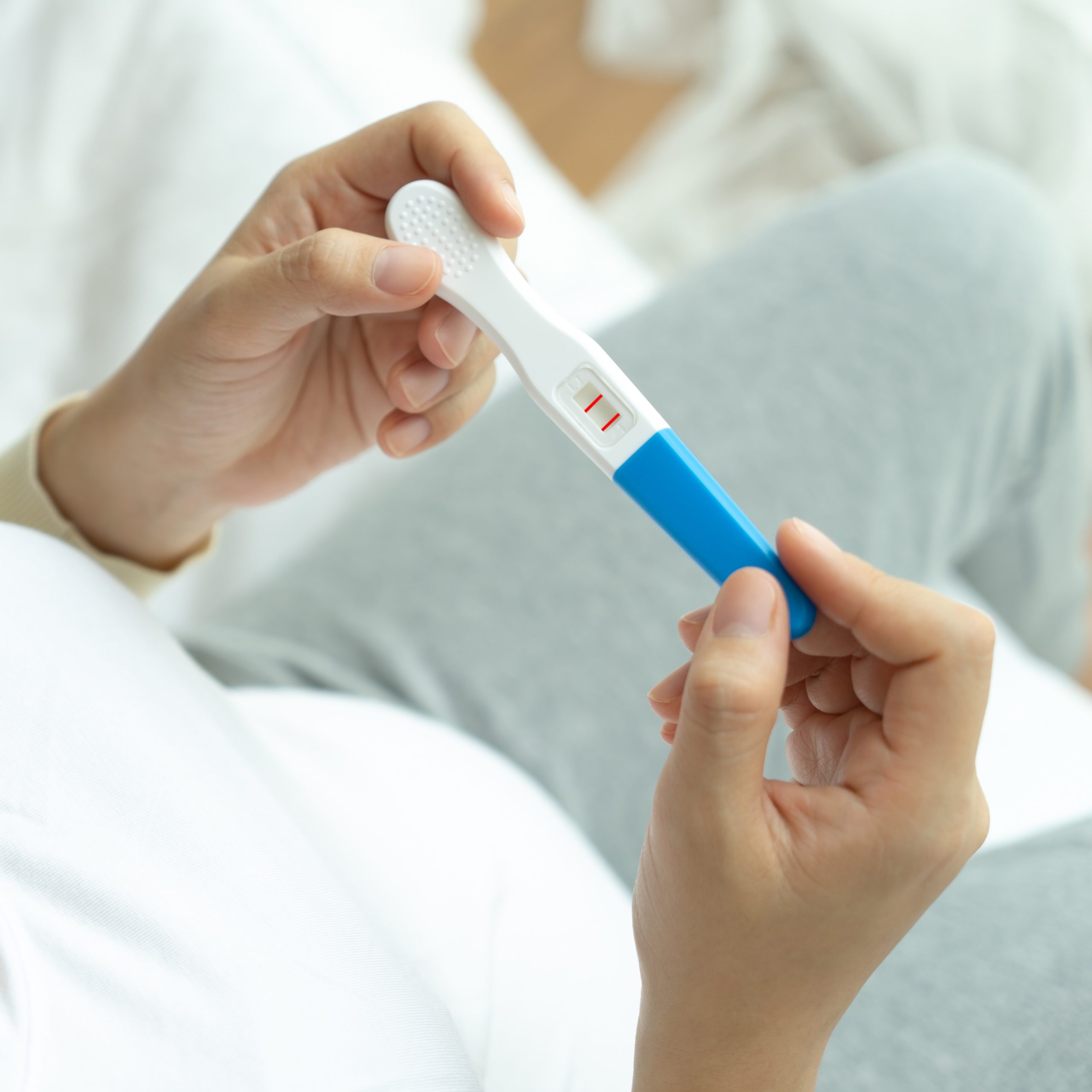 A woman holding a free pregnancy test in Russellville, Kentucky